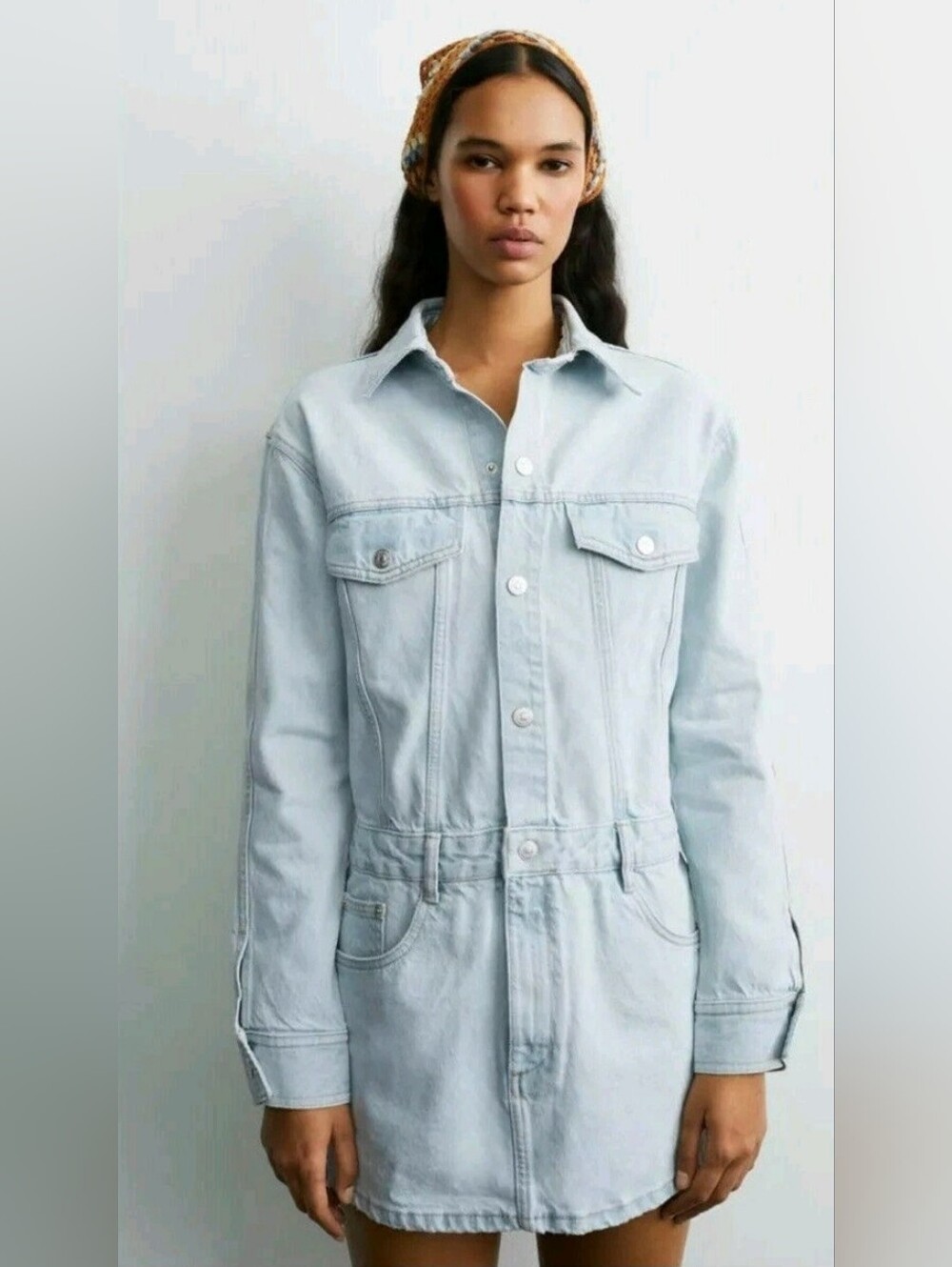 Zara Denim shirt dress features a button-front closure.
